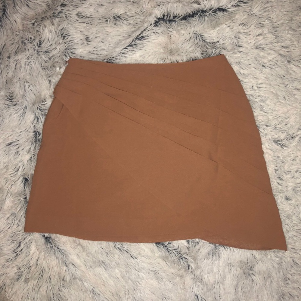 Camel colored asymmetrical mini skirt
